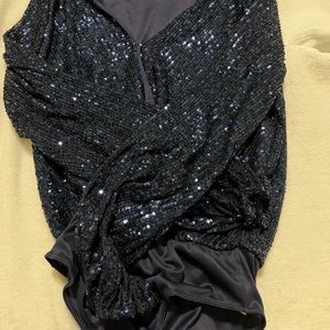 She + Sky g= blue glitter bodysuit